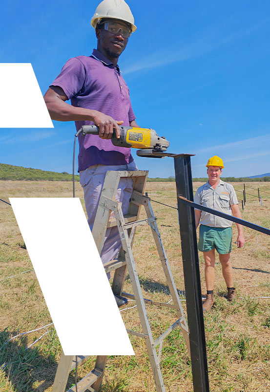 Farmer installing solar panel